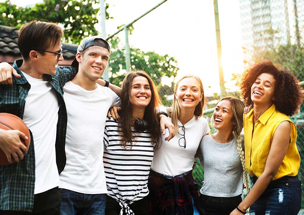 An image that shows a group of happy teens. Jonah Green and our other therapists work on an array of issues, including anxiety, depression, family issues, self-esteem, ADHD, and more, at the Kensington, MD, office.